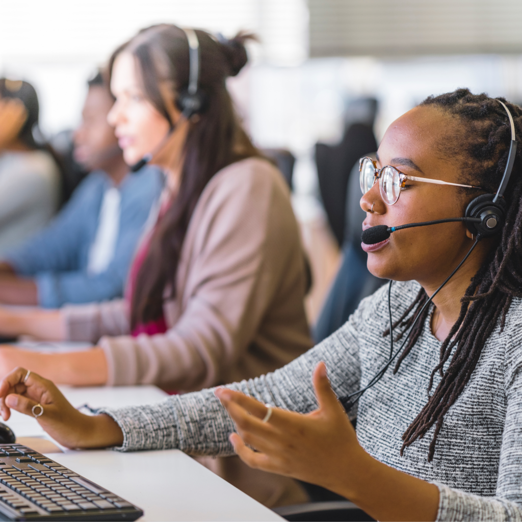 IT Support Bristol team members providing customer assistance in a call centre environment.